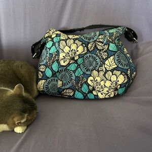 Blue/white quilted cotton shoulder bag with removable black leather strap.